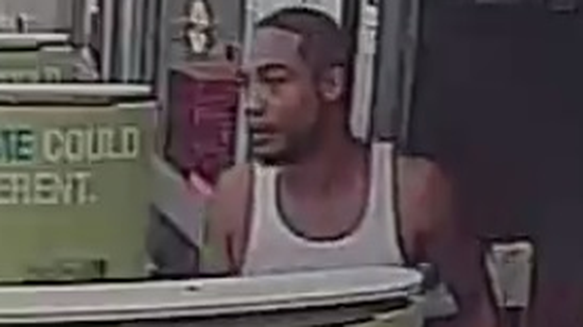 Wichita police have released photos of a man they say beat and robbed a 61-year-old outside of Walgreens.