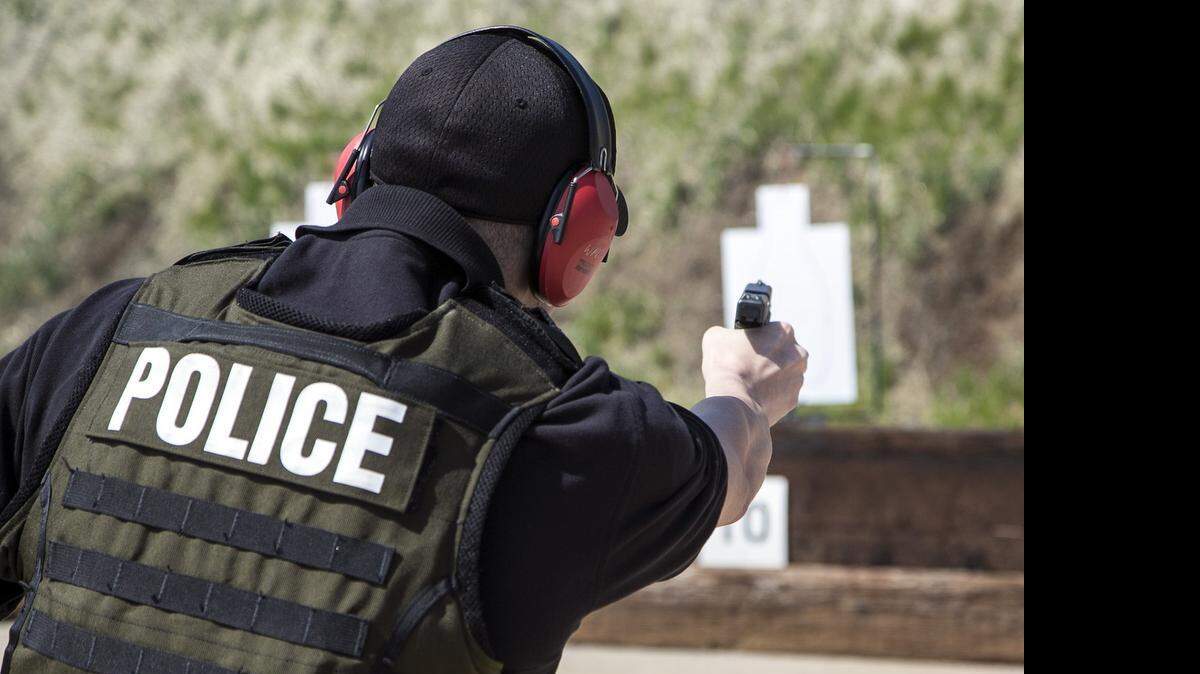 
Wichita police Officer Anthony Villegas practices shooting Wednesday at the Sedgwick County Sheriff's Office gun range near Lake Afton. (April 22, 2015)
