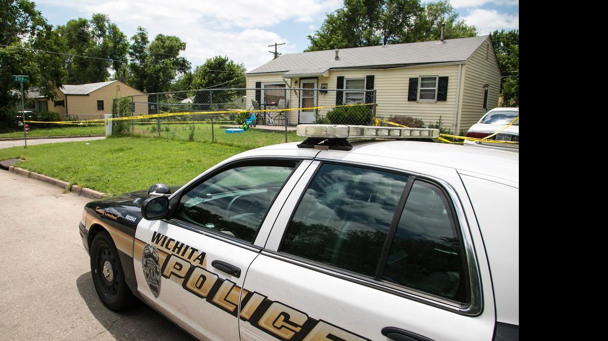 
Crime scene tape surrounds a house on the northwest corner of 23rd and Green on Friday, the scene of the city’s latest homicide, which was discovered Thursday night. 
