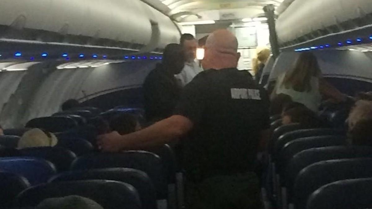 The band Augustines tweeted a photo of Wichita Eisenhower National Airport police on a diverted plane Tuesday night at the airport.