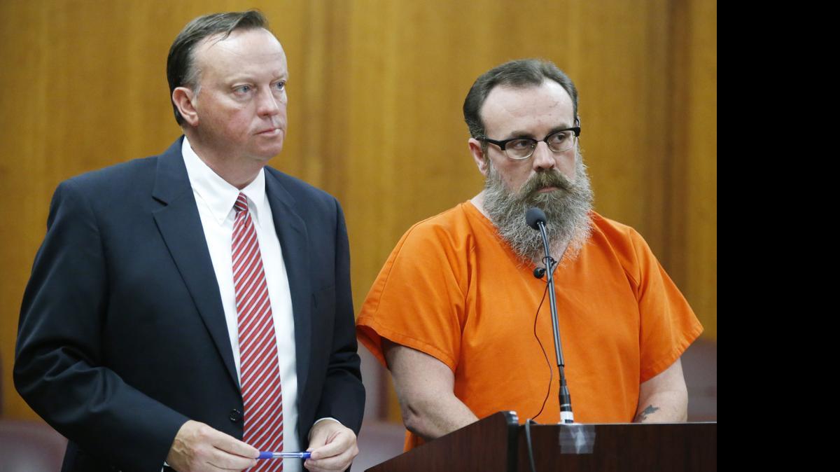 
Curtis Mitchell, right, and his defense attorney Mark Rudy respond to questioning by Judge Terry Pullman on Tuesday afternoon as Mitchell entered a guilty plea in the murder of Tanya Tandoc. (June 16, 2015)
