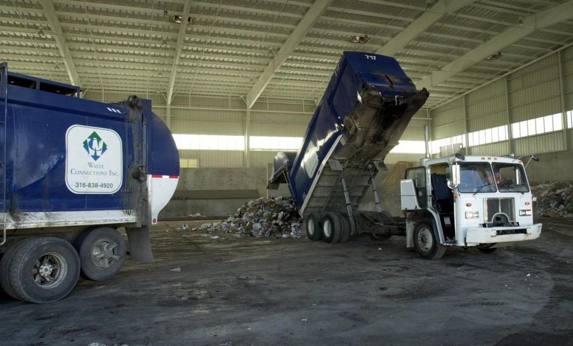 Trash is unloaded at the Waste Connections transfer station.