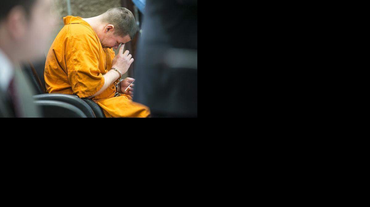 
Justin Edwards listens to victims’ statements in Butler County District Court during sentencing Thursday. Edwards pleaded no contest to charges of beating and choking 18-month-old Jayla Haag, the daughter of his girlfriend, in March 2012.
