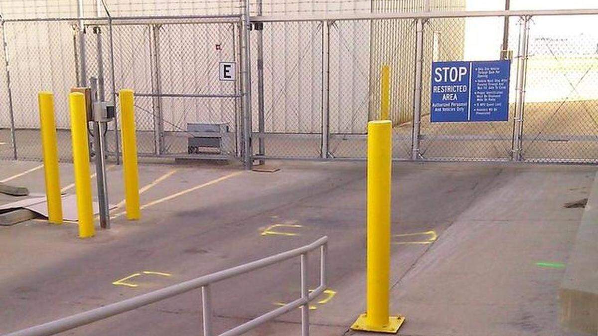 
The gate where Terry Loewen was arrested is located between Hawker Beechcraft Services, where he worked, and Yingling Aviation at Wichita Mid-Continent Airport in 2013. The yellow paint on the drive mark where the van was parked. 
