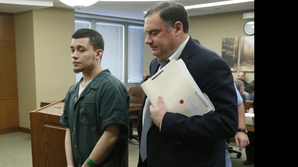 
Anthony Bluml is escorted by his lawyer Mark Manna from Judge Ben Burgess' courtroom Tuesday morning after being sentenced to life without parole in the deaths of his adoptive parents Roger and Melissa Bluml. (June 16, 2015)
