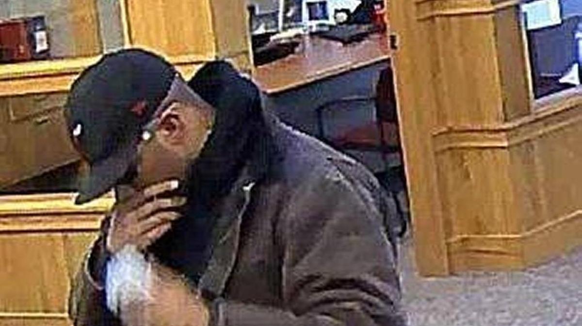 This surveillance photo shows a man accused of robbing the Emprise Bank branch near Pawnee and Hydraulic on Nov. 18.