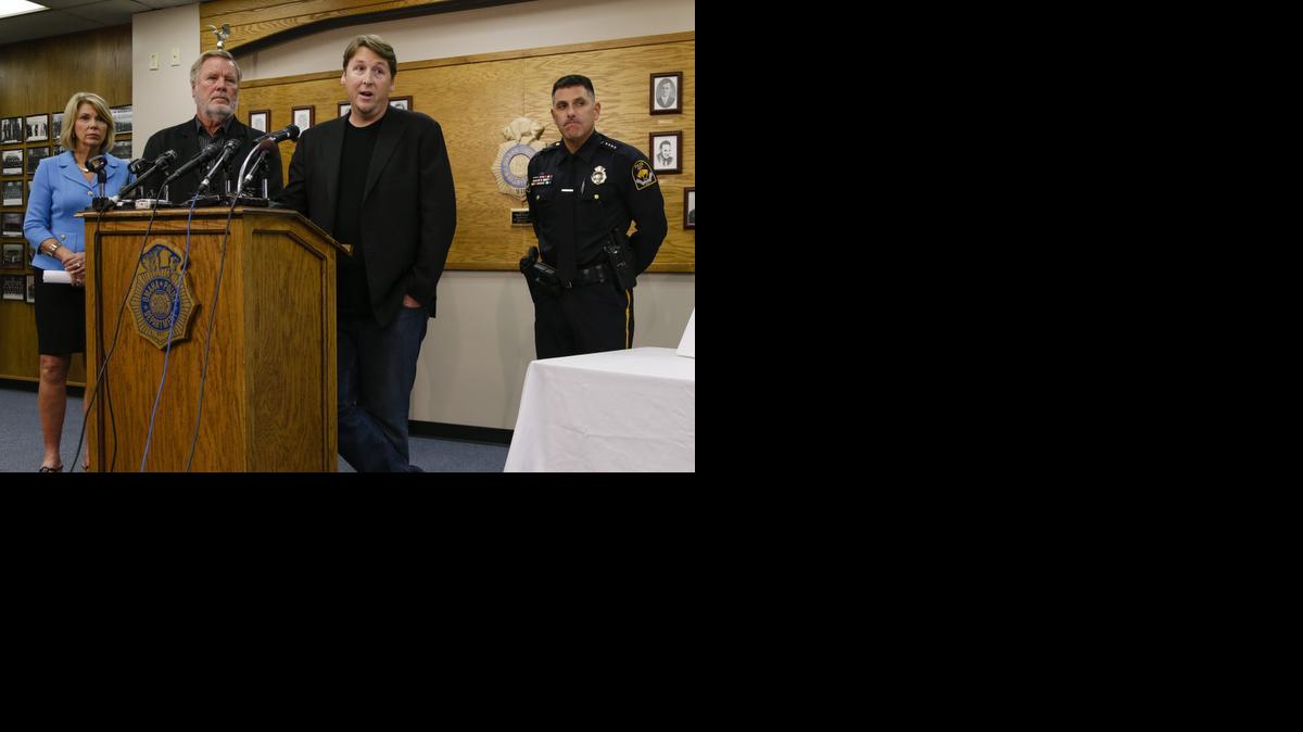 
Producers of the "Cops" show John Langley, second left, and Morgan Langley, second right, answer questions with Omaha police chief Todd Schmaderer, right, and Omaha Mayor Jean Stothert, left, during a news conference Wednedsay at police headquarters in Omaha. Bryce Dion, a sound technician with the “Cops” television show who was embedded with Omaha police, was killed Tuesday during an armed robbery at a Wendy's fast-food restaurant. 
