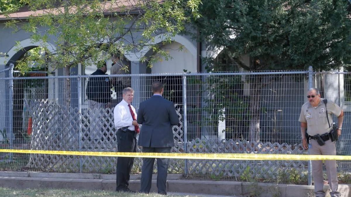 Wichita police detectives investigate the shooting deaths of an elderly couple at their home on South Ida.