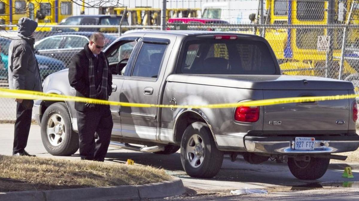 Wichita police investigate the scene where an employee was found shot in the parking lot of Santana Concrete on Feb. 21, 2014. Deon Nolan Hale was sentenced Wednesday to 100 months in jail in the death of Efren Antonio Villarreal-Alvarado.