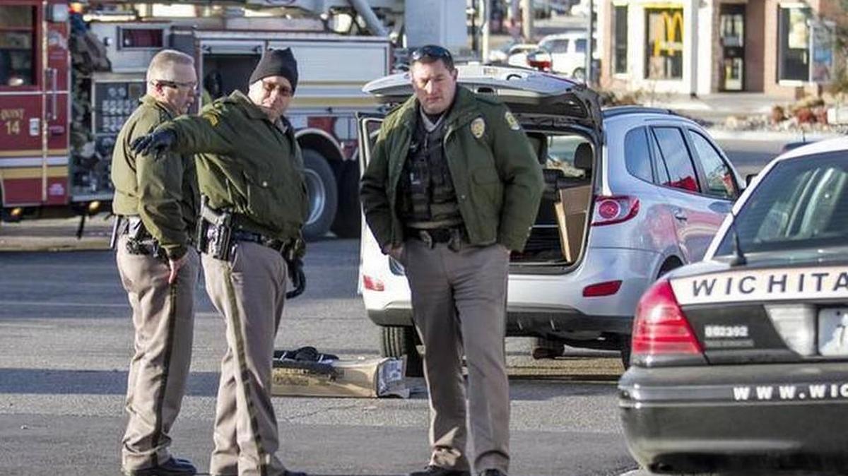 Wichita police investigate the scene of an accident on Feb. 5, 2015, in which a woman was struck by a vehicle in the parking lot of the Dillons at 21st and Rock Road. Annette Hedke was killed in the accident.