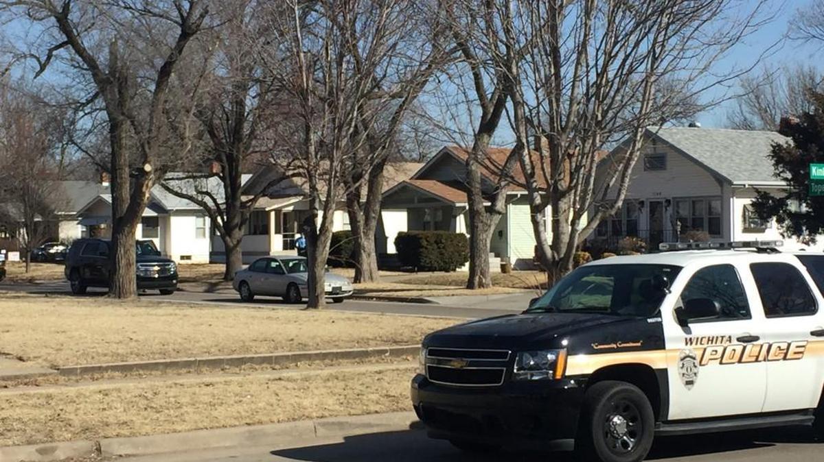 Wichita police investigators at the scene where an officer was run over on Tuesday. (Feb. 9, 2017)