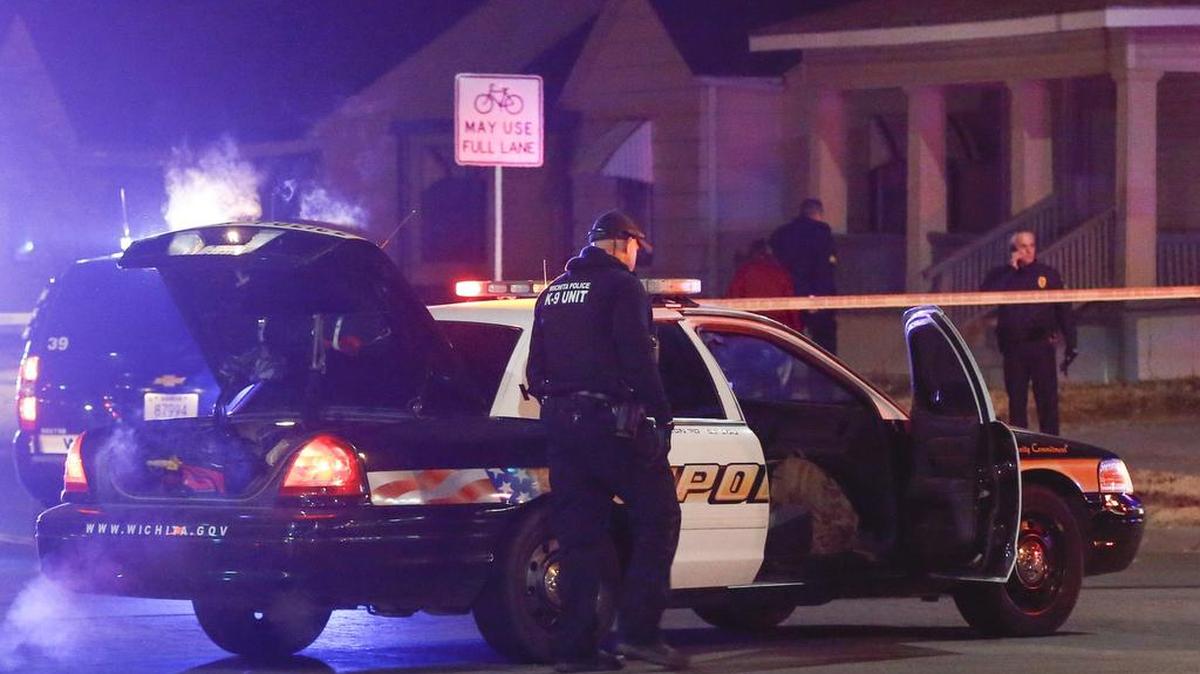 Wichita police investigate a call of a possible hostage situation near the corner of McCormick and Seneca Thursday night. A man was fatally shot by a police officer in what is believed to be a gaming prank called "swatting." (Dec. 29, 2017)