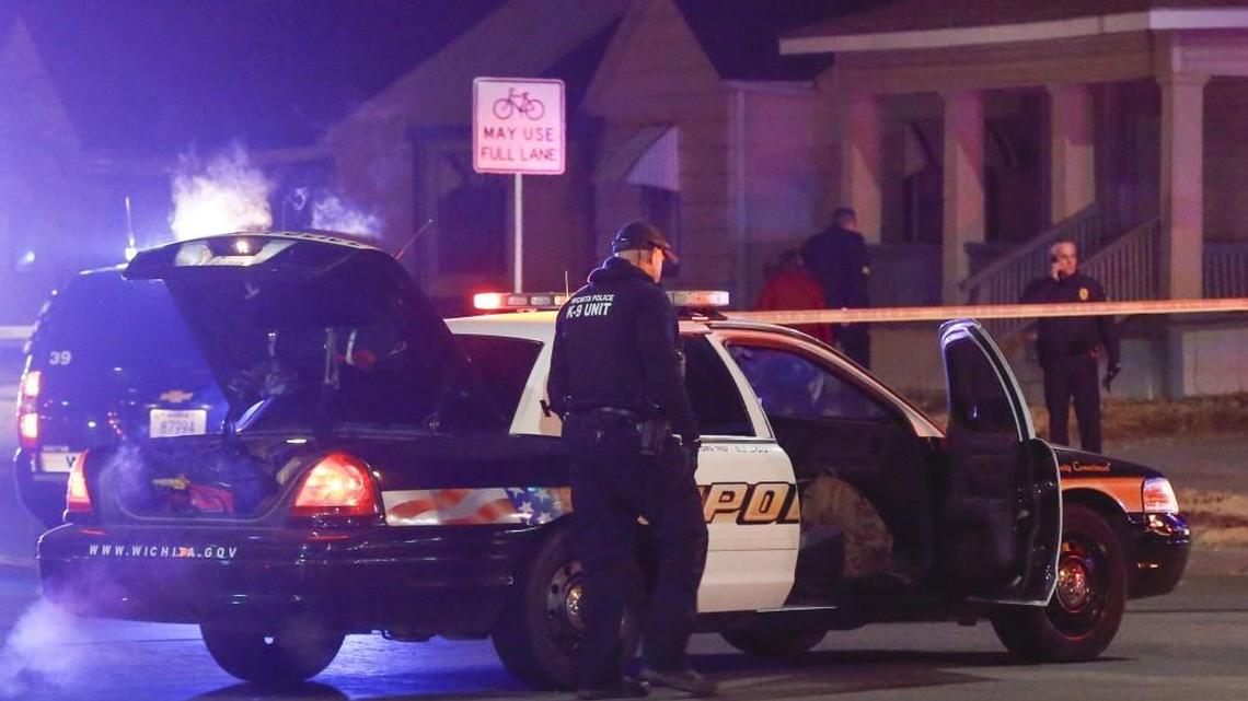 Wichita police investigate a call of a possible hostage situation near the corner of McCormick and Seneca Thursday night. A man was fatally shot by a police officer in what is believed to be a gaming prank called "swatting."