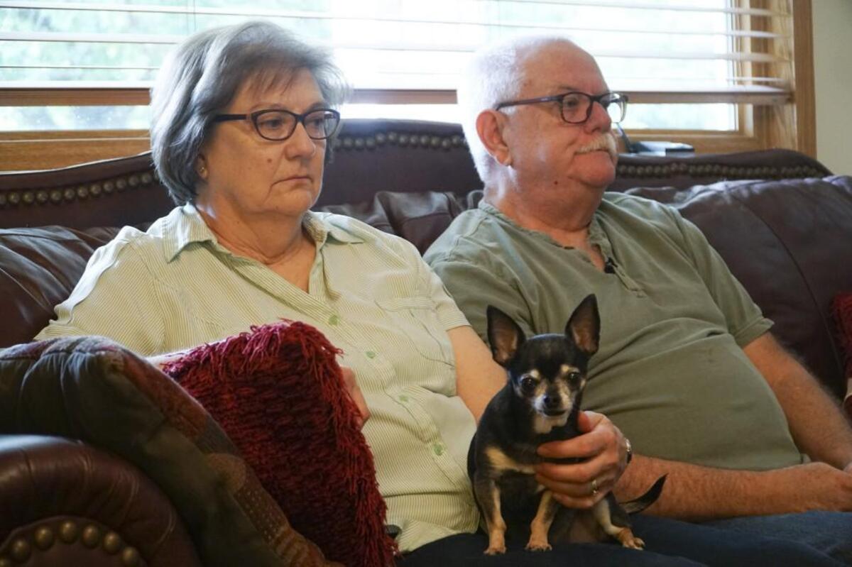 Judith and Bruce Nystrom with their dog, Mercedes. The couple's 30-year-old daughter, Kendra Nystrom, has been missing since May. She was last seen at her parents’ home in Maize. (October 6, 2017)