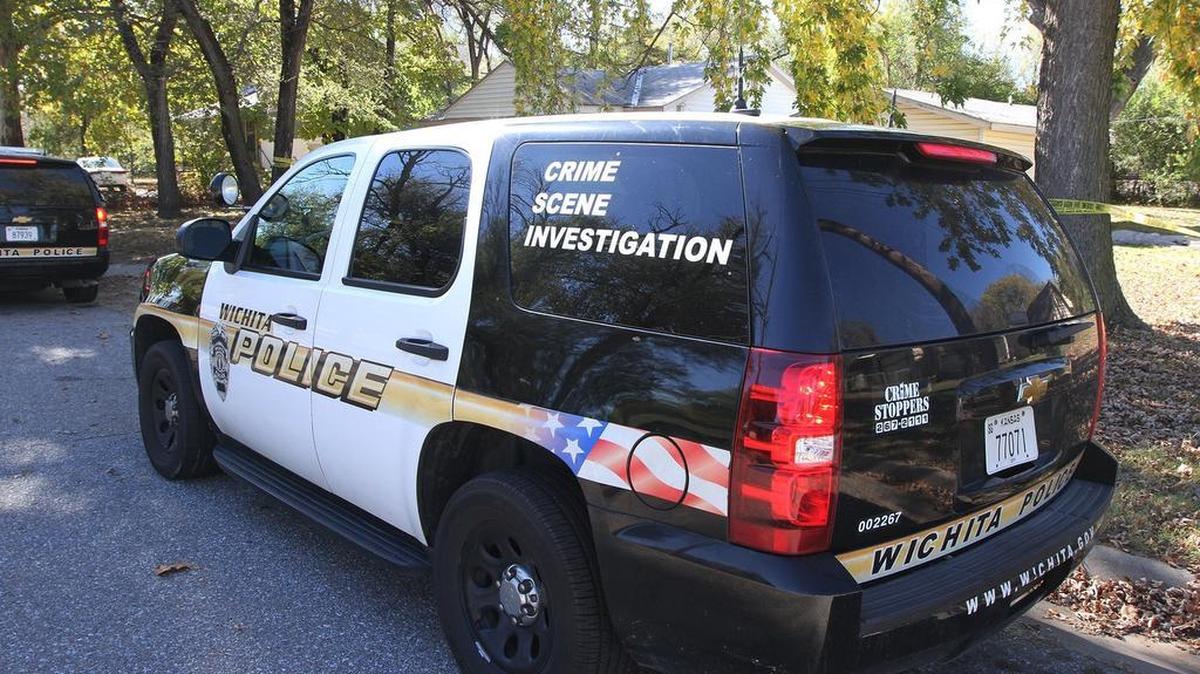 A Wichita Police Department crime scene investigation vehicle was at the scene of an overnight beating death of a woman in the 4500 block of South Main. (Nov. 2, 2015)
