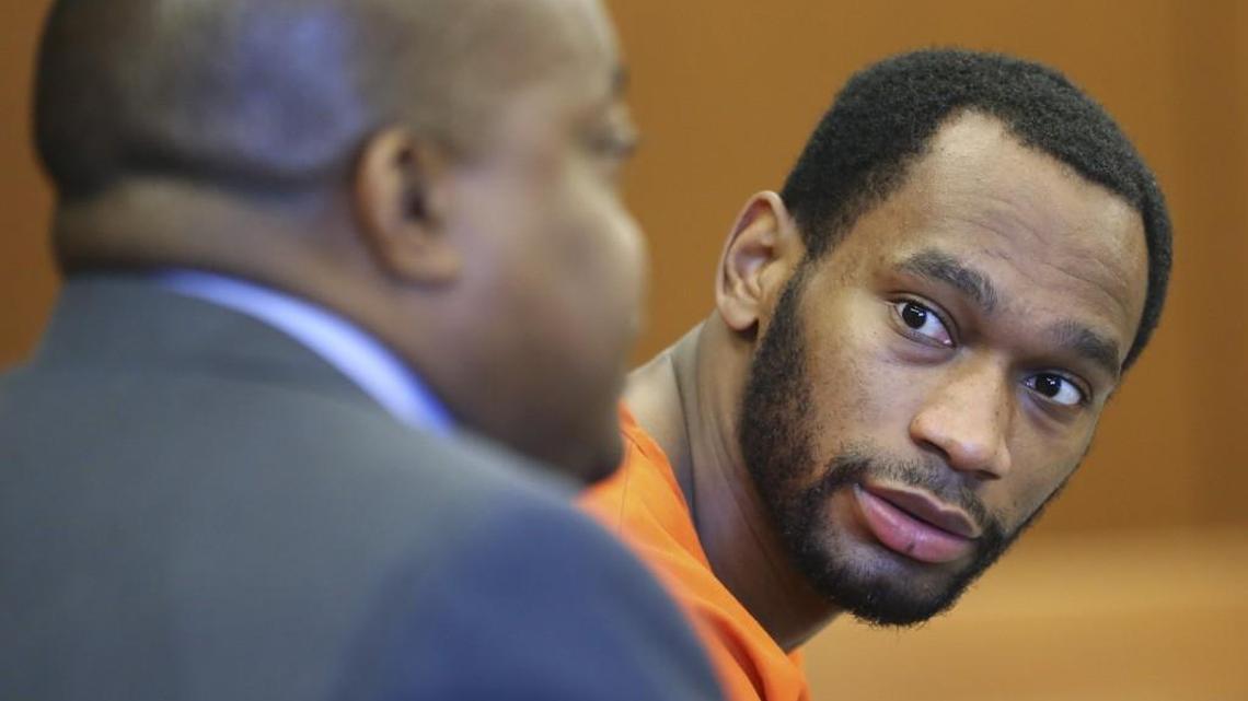 Former Dallas Cowboys running back Joseph Randle looks toward his attorney while in court earlier this year.