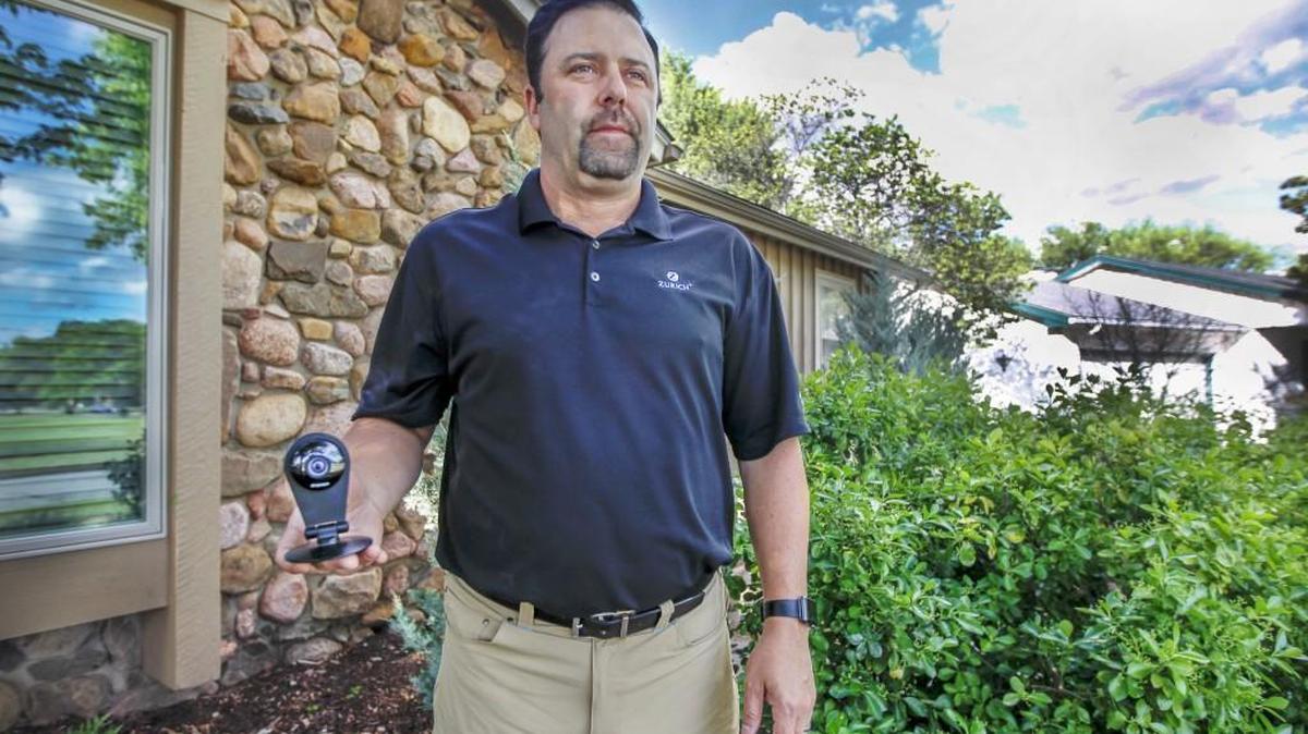 After buying a home security camera, Eric Johnsen noticed that some suspicious night-time visitors had been checking out cars in his east Wichita neighborhood. (April 27, 2016)