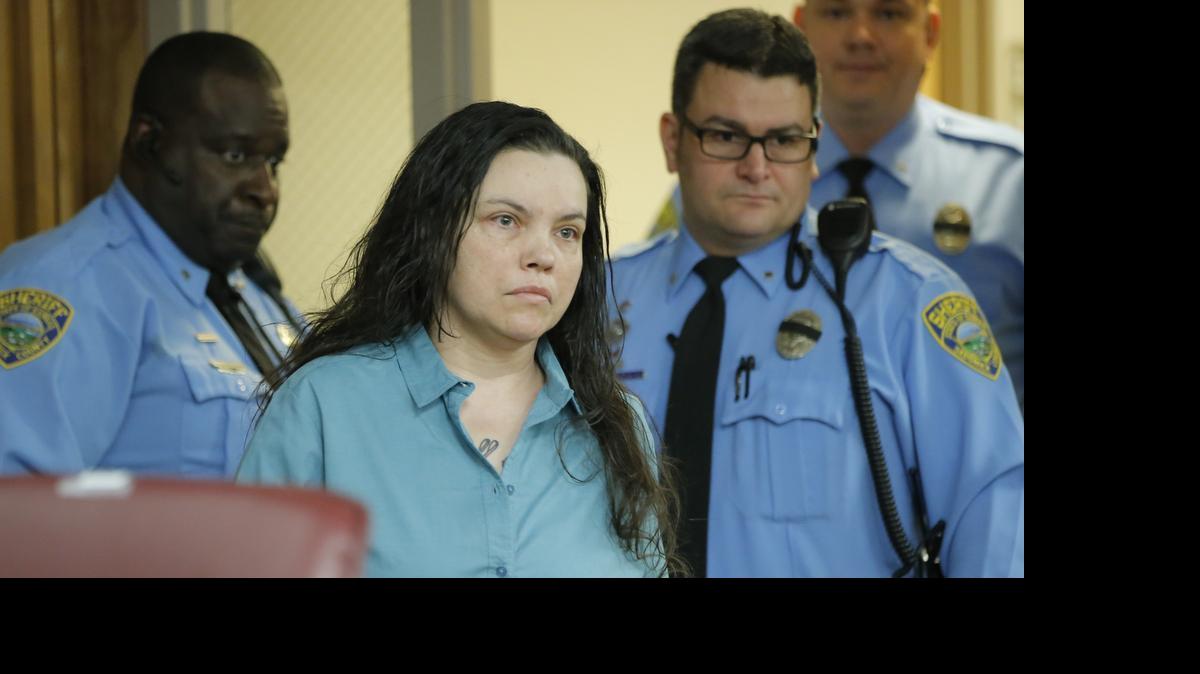 
Kisha Schaberg enters a Sedgwick County courtroom on Friday to plea no contest to capital murder charges in the 2013 shooting deaths Roger and Melissa Bluml. Judge Jeffrey Goering found her guilty of the murder charges, along with aggravated robbery, during the plea agreement hearing.

