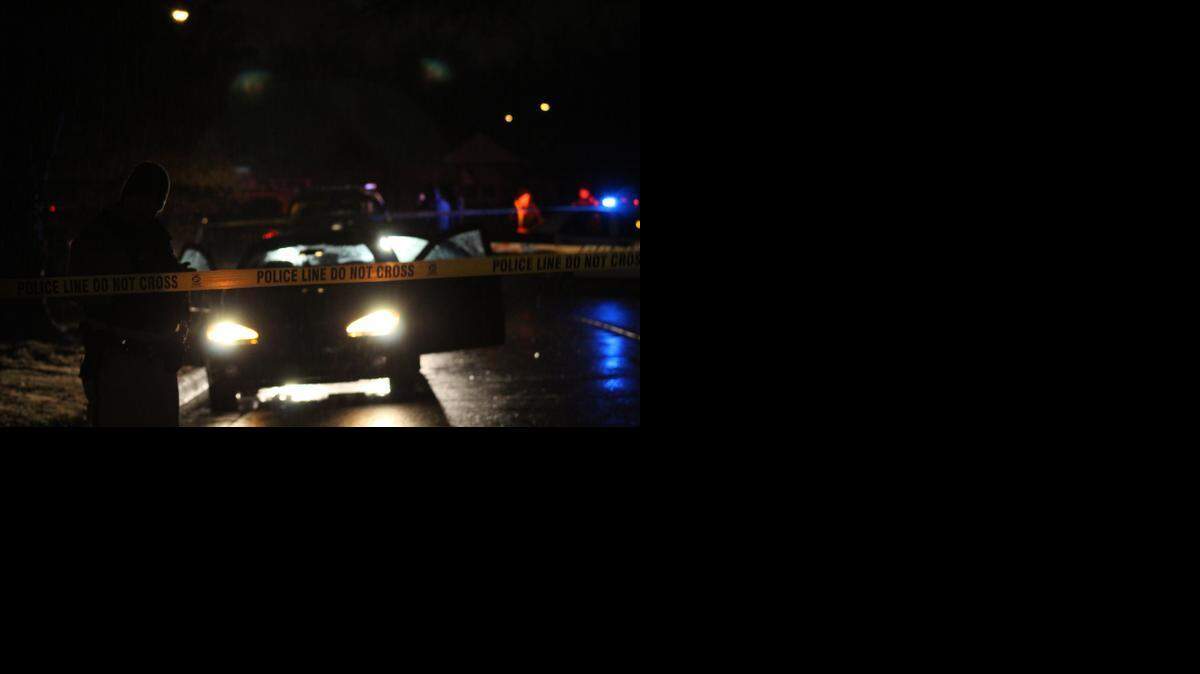
Wichita police investigate the scene of a drive-by shooting Saturday night. (Jan. 31, 2015)
