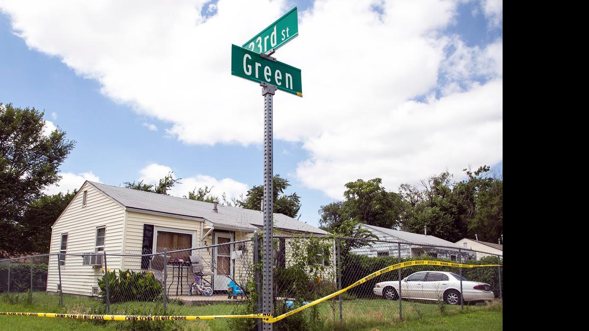 
Crime-scene tape surrounds a house in June on the northwest corner of 23rd and Green, where 27-year-old Ciera Ray was found stabbed to death. (June 27, 2015)
