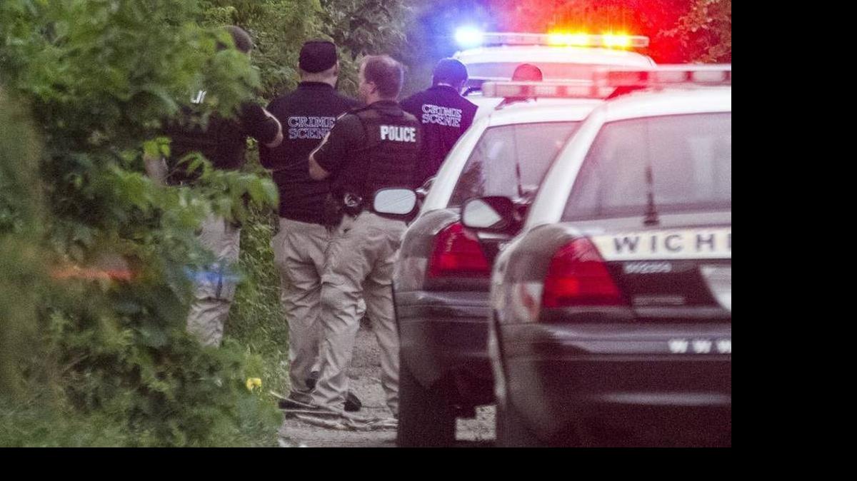 
Wichita police on Monday investigate the scene of an early morning officer-involved shooting in an alley near Osie and Water in south Wichita.
