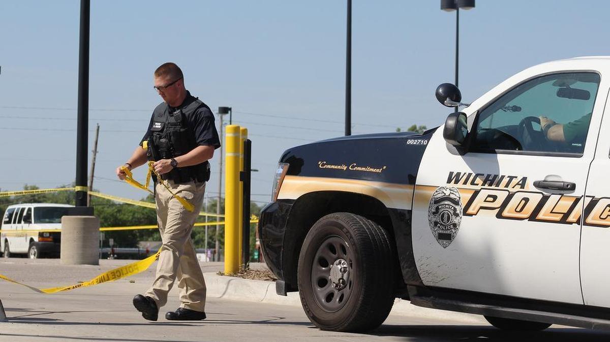 Wichita police investigate the death of Rayan Ibrahim Baba in the parking lot of the Fairmount Towers dormitory on Wichita State’s campus. (Aug. 8, 2015)