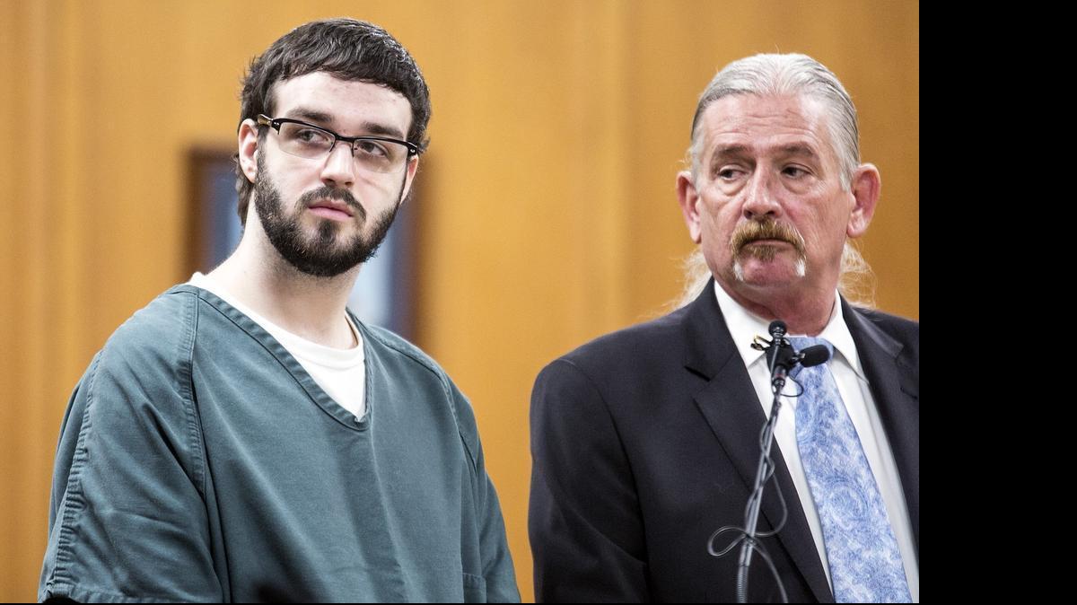 
Andrew Ellington, left, one of four defendants in the fatal shooting of a Valley Center couple in 2013, changed his plea from not guilty to no contest during an unscheduled appearance with his attorney Jay Greeno in Sedgwick County District Court on Tuesday. (June 23, 2015) 
