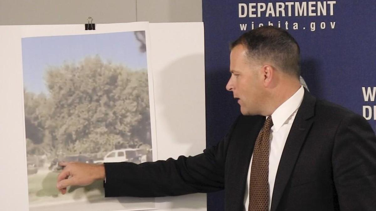 Wichita Police Chief Gordon Ramsay points to a still frame from a witness who shot a police chase that led to a police officer shooting an unarmed suspect. The sergeant thought the suspect posed a danger when he shot him, Ramsay said. (Sept. 19, 2016)