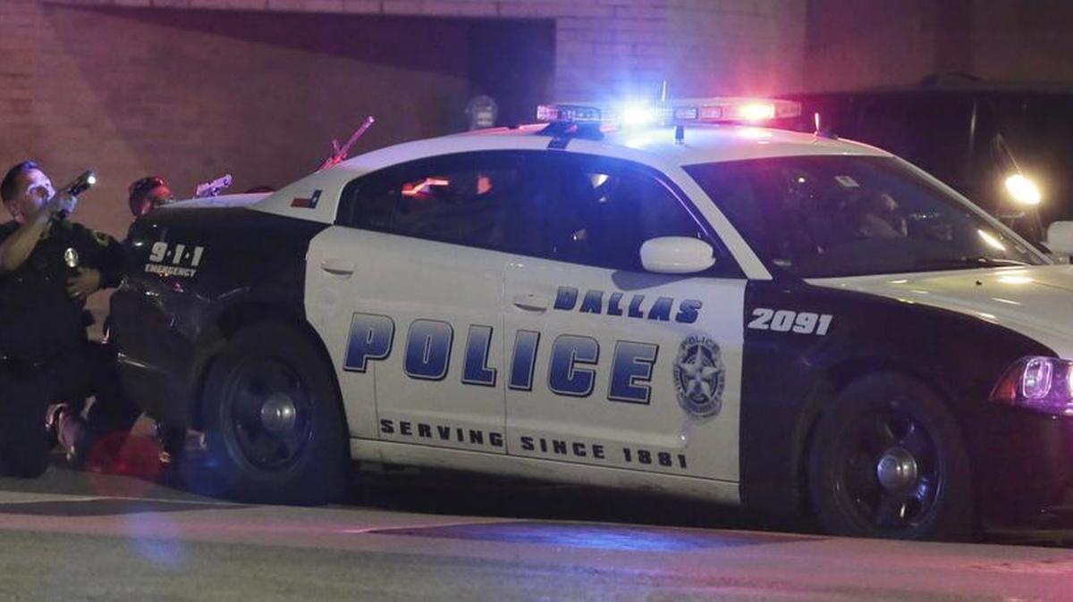 Dallas police respond after shots were fired during a protest over recent fatal shootings by police in Louisiana and Minnesota, Thursday, July 7, 2016, in Dallas. Snipers opened fire on police officers during protests; several officers were killed, police said.