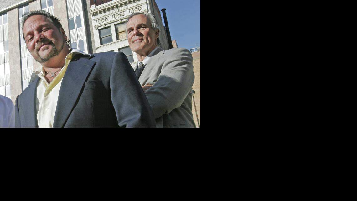 
A complaint accuses Michael Elzufon, left, and David Lundberg, right, shown here in 2006, of defrauding at least one Kansan and 59 residents of other states by offering and selling unregistered securities in their businesses. 
