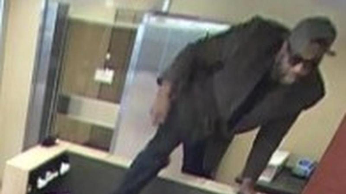 Anyone who recognizes this man is being asked to call 911. This image was captured during a bank robbery Wednesday afternoon.