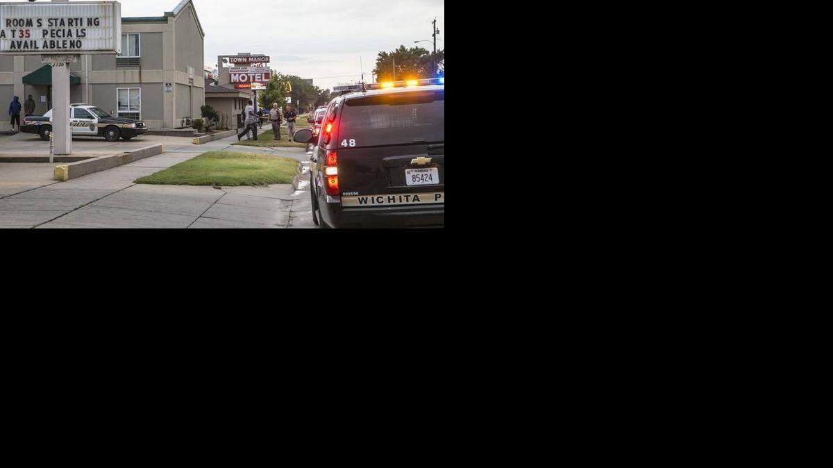 
Wichita police investigate the scene of a shooting around 10th Street between Market and Broadway on Wednesday morning.
