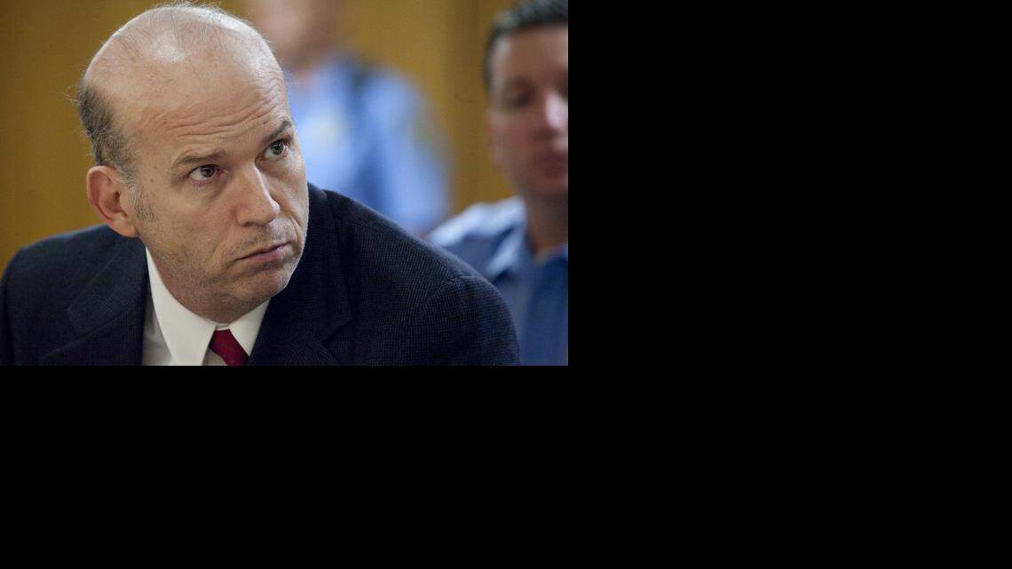 
Scott Roeder listens to his attorneys during a pre-trial motion hearing inside a Sedgwick County District Courtroom on Jan. 12, 2010. 
