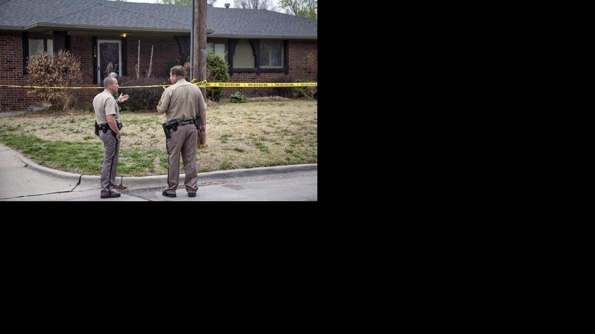 
Police at the scene of a fatal shooting of a woman early Wednesday morning, reported at 12:40 a.m. in the 1100 block of West 20th Street. (April 8, 2015)
