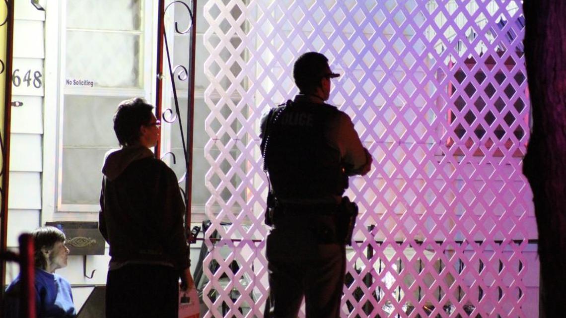 Police investigate in the 1700 block of South Roanoke in Wichita where 35-year-old Brandon Walters was shot and killed in March. (March 3, 2016)
