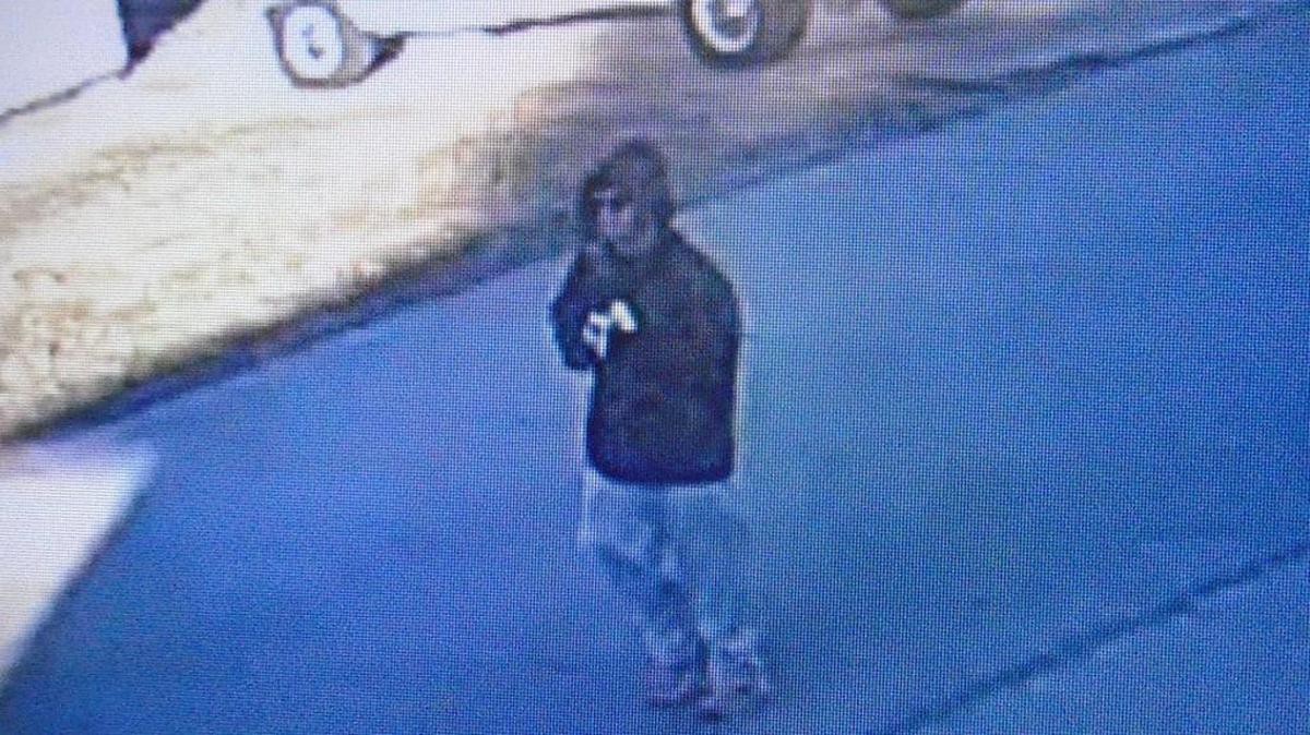 Emporia police have surveillance pictures of a man they say was hanging around William Allen White School on Thursday.