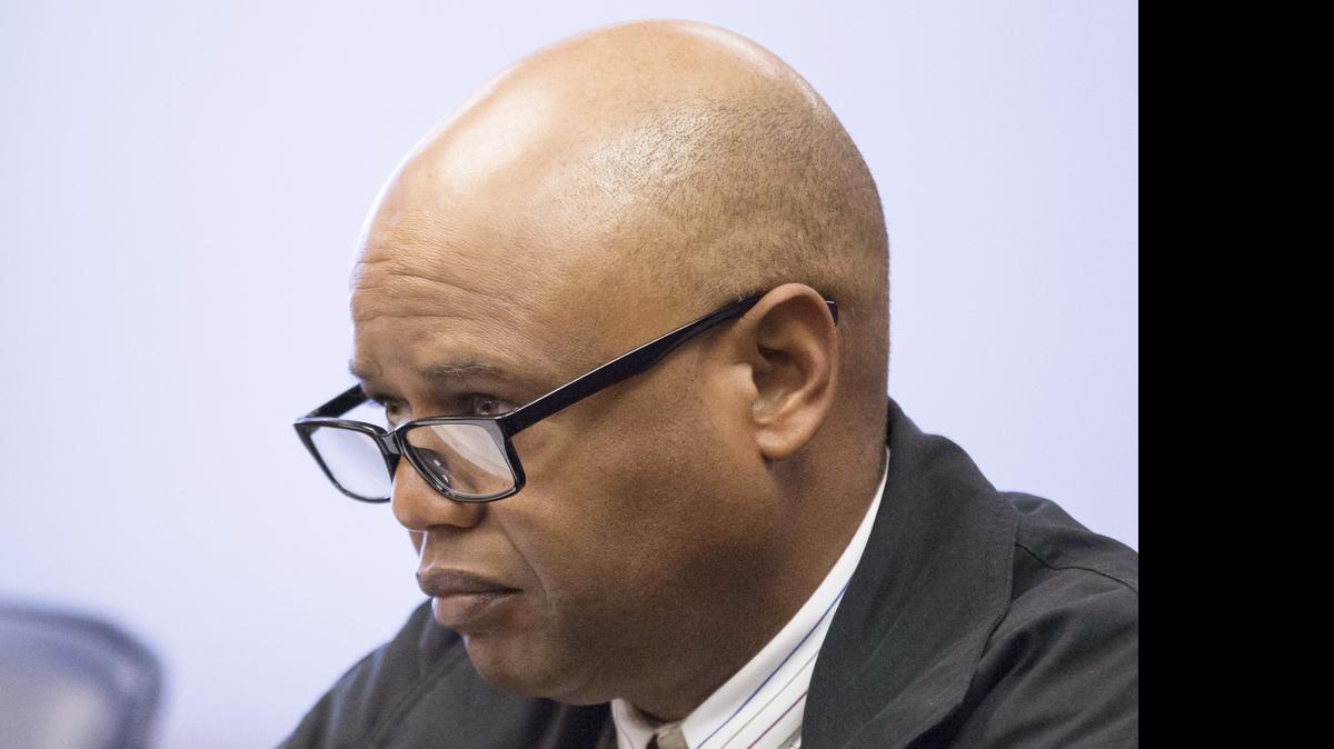 
Former Wichita police officer and public schools safety supervisor Alex Robinson sits in a Sedgwick County courtroom in April at the start of his preliminary hearing. Robinson is charged with multiple sex crimes against children. (April 29, 2015) 
