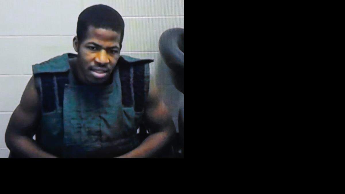 
David Cornell Bennett Jr. of Cherryvale appears via video from jail in Oswego, Kan., before Labette County District Judge Robert Fleming on Monday, Dec. 2, 2013 in Parsons.

