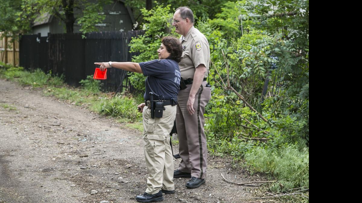 
Wichita police continue their investigation Wednesday afternoon at the scene of an officer-involved shooting that occurred in an alley between Water and Wichita streets in south Wichita early Monday morning. (May 6, 2015)
