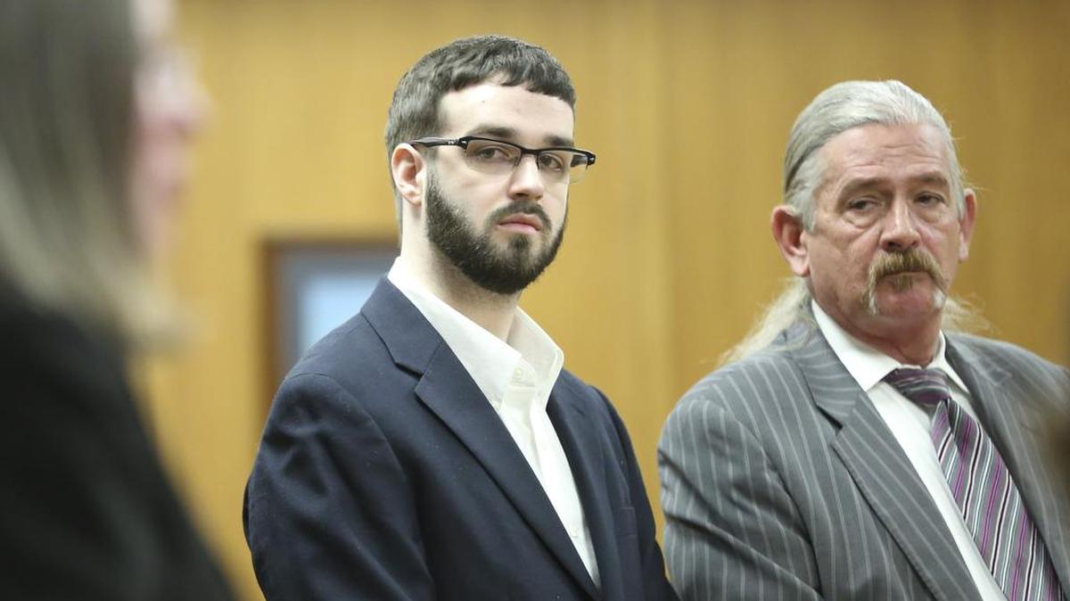 
Andrew Ellington, left, and his attorney, Jay Greeno, stand in Judge Warren Wilbert’s courtroom Thursday for sentencing. Ellington, the third of four people convicted in the killing of a Valley Center couple in 2013, received life in prison, plus 155 months, for his role in the crime. The 20-year-old pleaded no contest in June to first-degree and second-degree murder. (Aug. 27, 2015) 
