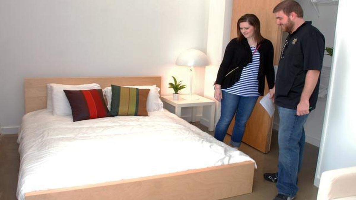 
Brynn Blasdel and Katie Gee check out a bedroom at Finn Lofts during the Downtown Living Tour on Sunday afternoon.
