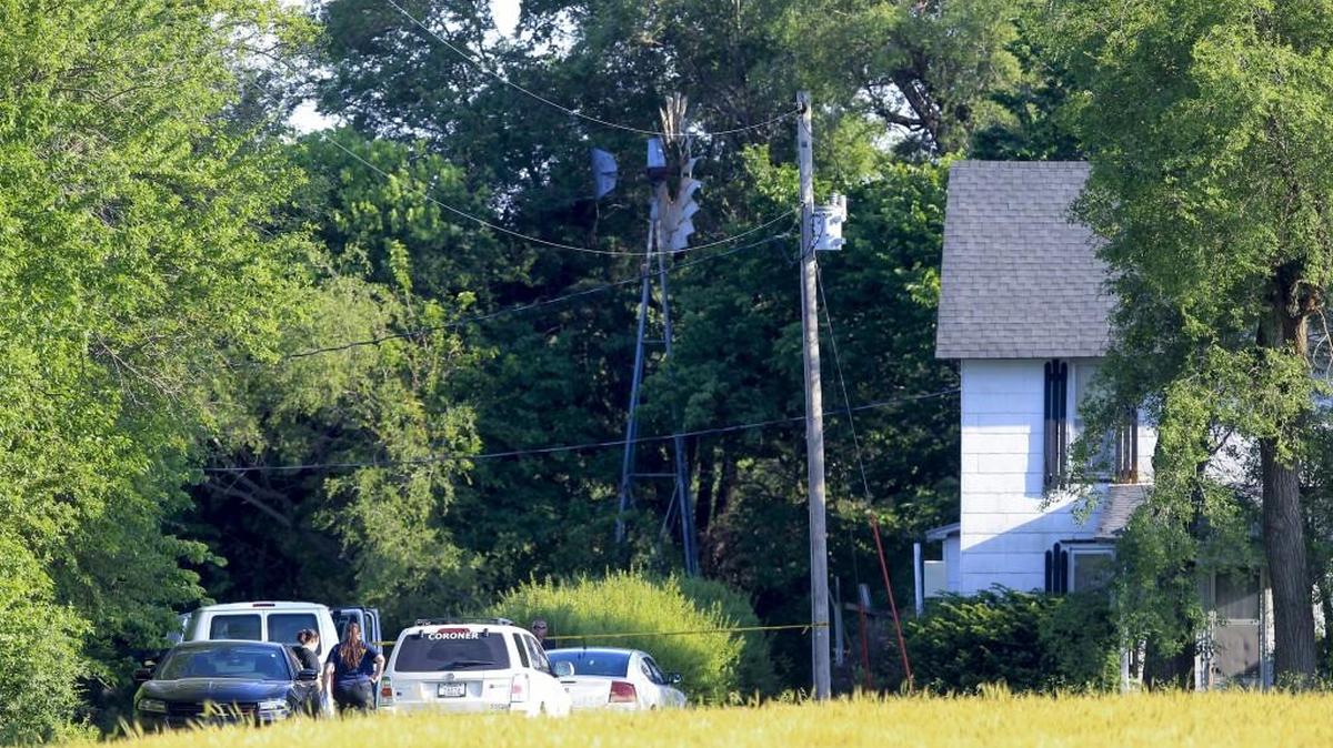 Law enforcement officials investigate the scene of a western Sedgwick County home, where human remains were found when a landowner mowing his property came across the remains. (May 15, 2017)
