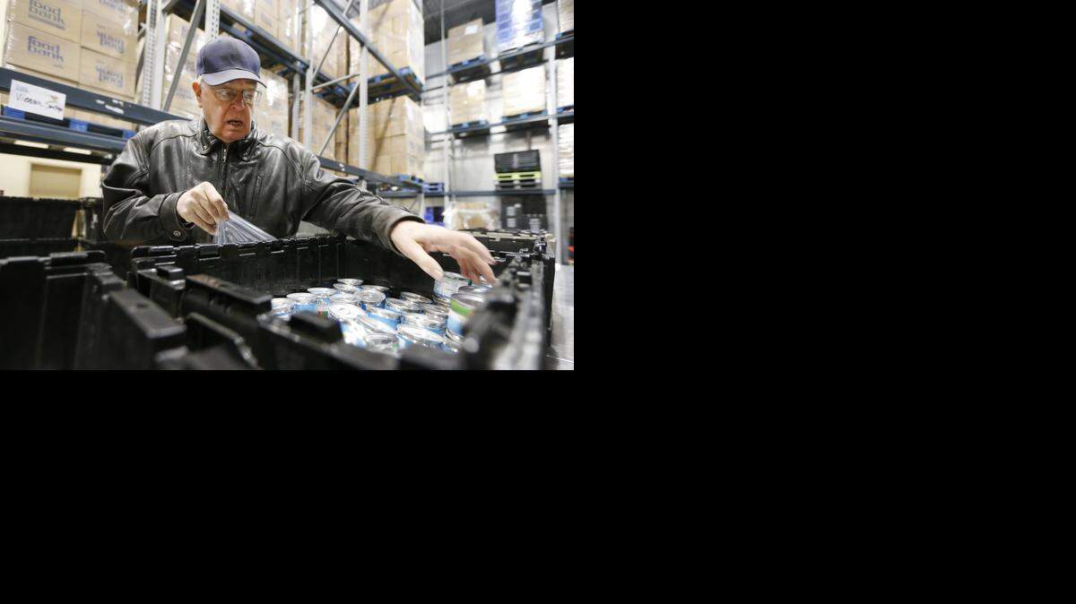 
Gerry Sibely, 77, is a regular volunteer at the Kansas Food Bank. (December 19, 2014)
