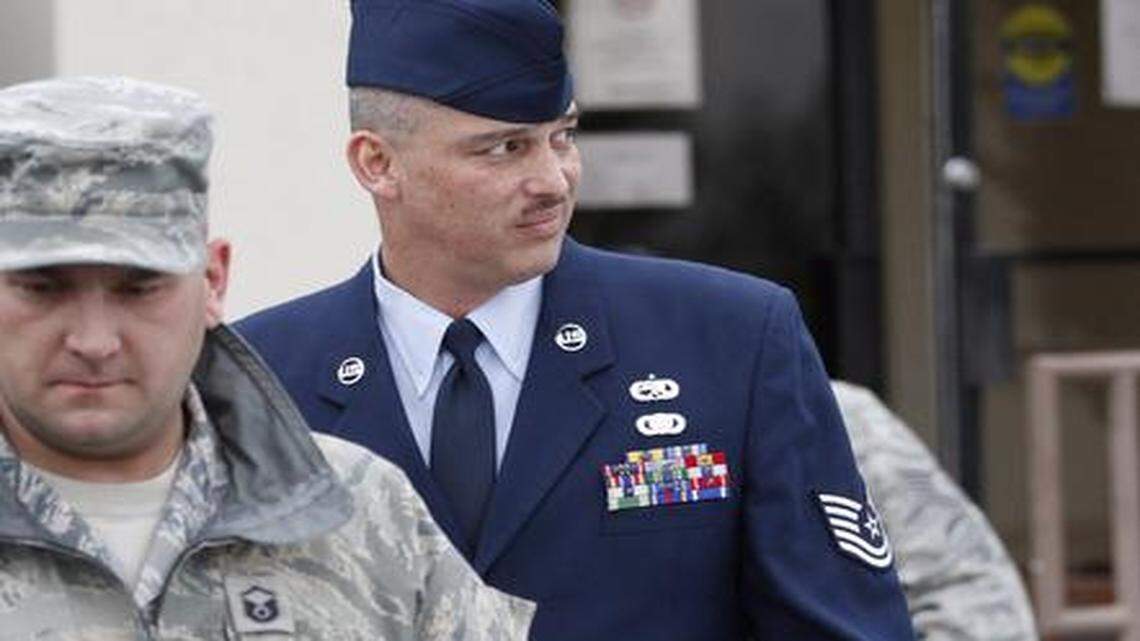 
David Gutierrez walks out of the Law Center at McConnell Air Force Base. (Jan. 29, 2011)
