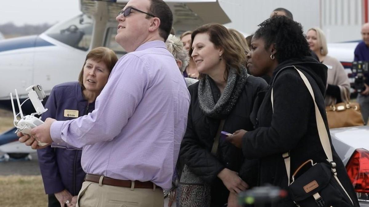 Kansas State professor David Burchfield demonstrates a drone flight at an event announcing a new partnership between Butler Community College and Kansas State. Butler will offer an associate’s degree in unmanned aircraft systems