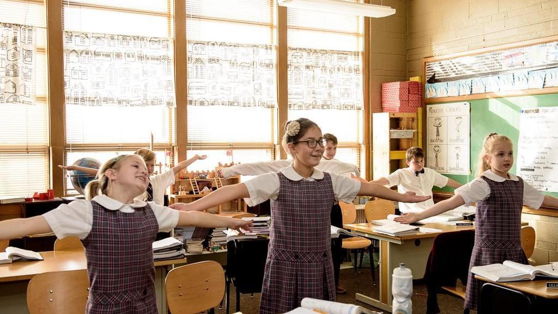 Students stand in their classroom at the Classical School of Wichita, which opened in 2005.