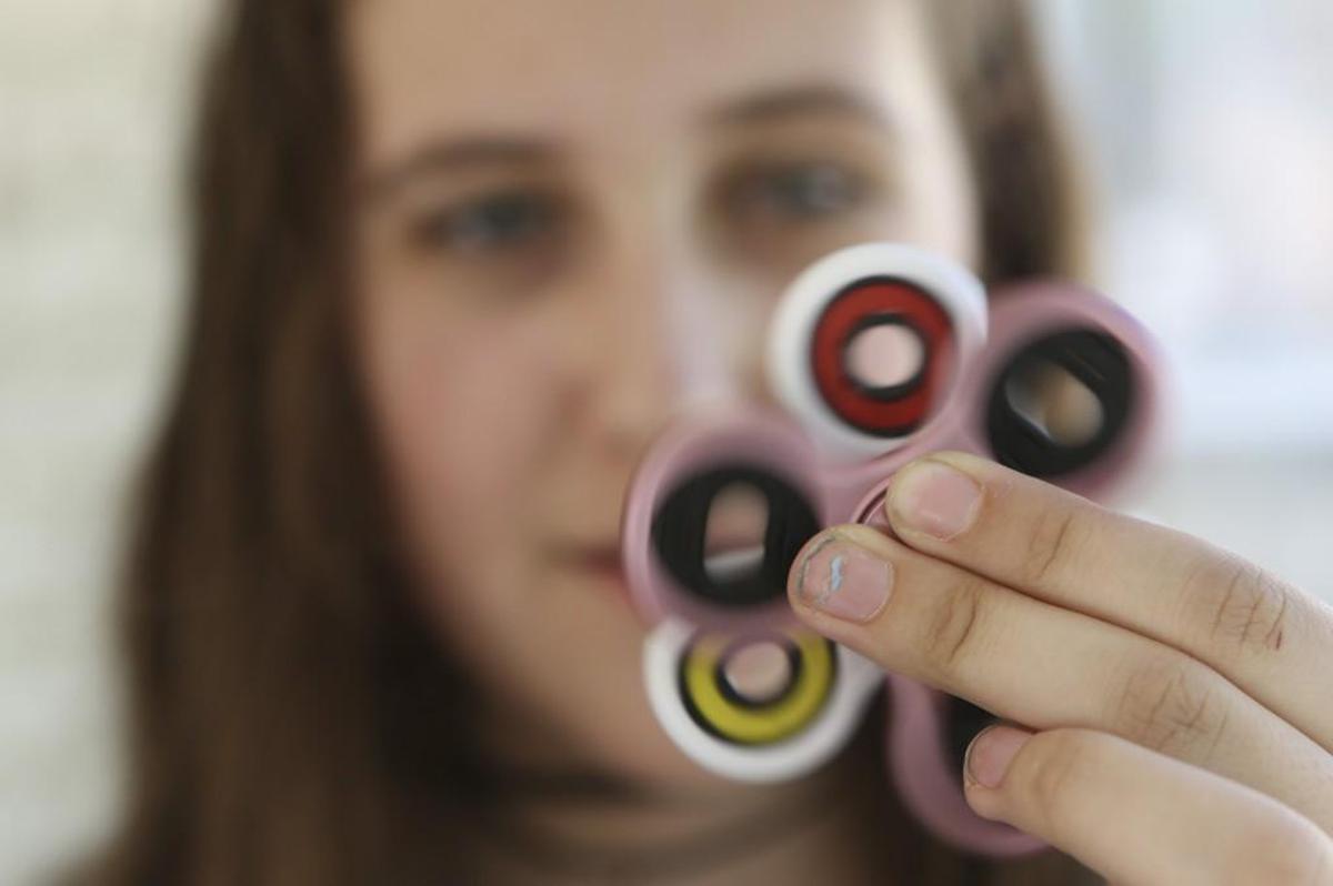 Wichita district officials said there’s no flat-out directive regarding fidget spinners. They let principals decide whether and how to manage the craze.