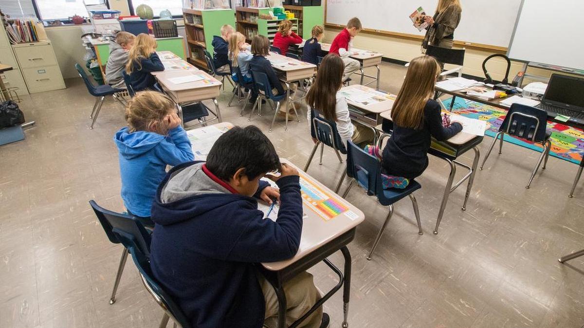 Gifted education students listen to a lesson given by Teresa Young at McCollom Elementary School. (Jan. 7, 2015)