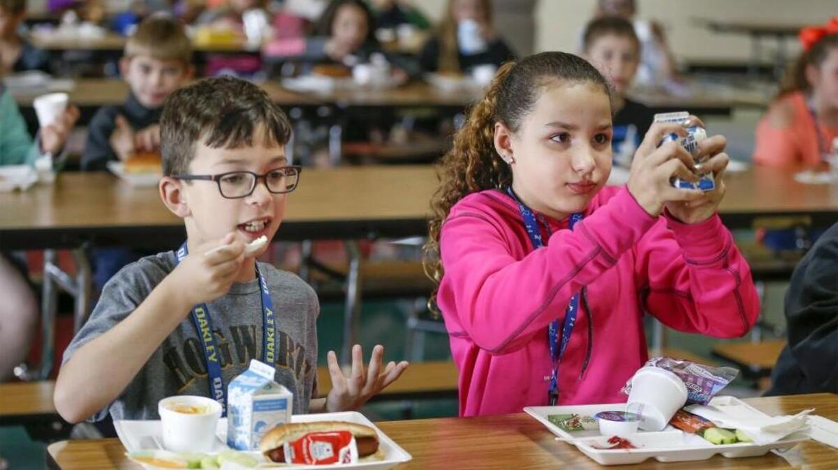 Explorer Elementary fourth-graders Braden Taylor and Elizabeth Norton have lunch at their school in Goddard on Tuesday. (May 2, 2017)