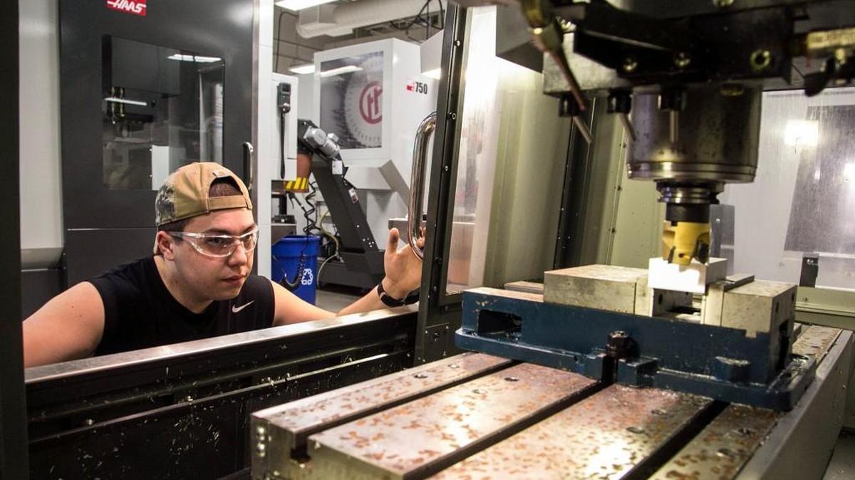 Wichita Area Technical College student Jacob Richardson attends a CNC operation class. WATC has seen its enrollment hit a record this fall. (March 2, 2016)